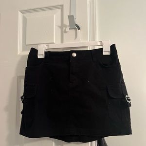 black mini denim skirt with buckles